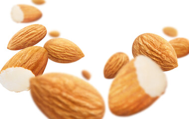 Flying almonds, isolated on white background