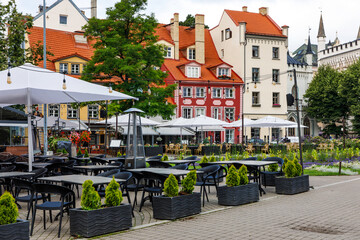 Cafe table on the central market square of old European town.
