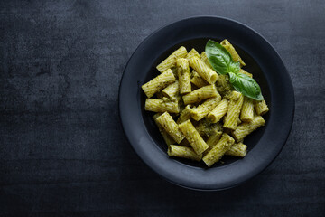 Pasta pesto and pea sauce served in bowl
