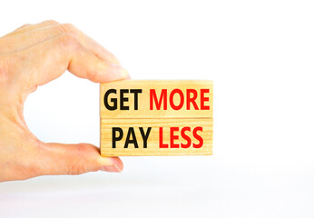 Get more pay less symbol. Concept words Get more pay less on wooden blocks on a beautiful white table white background. Businessman hand. Business Get more pay less concept. Copy space.