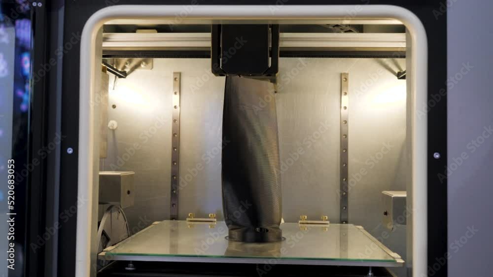 Poster large 3d printer. media.a huge 3d printing machine with internal illumination.