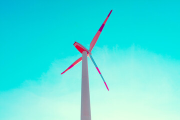 Wind turbine against sky . Wind making electricity