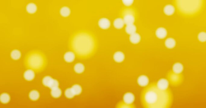 Yellow gold background with blurry or out of focus bokeh, white circles spread across sheet for background or wallpaper. 3D Rendering