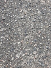 he texture of the concrete , grey stone background , wall of cement, a fragment of a concrete slab