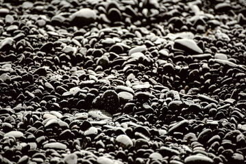Black pebbles background