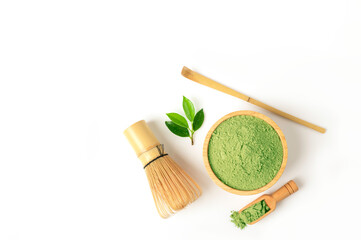 Macha tea with scoop and leaves isolated on white background. Top view