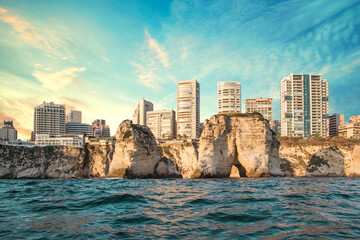 Beautiful view of the Pigeon Rocks on the promenade in the center of Beirut, Lebanon - obrazy, fototapety, plakaty