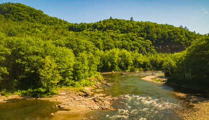 Fototapeta na wymiar scenic Vermont river view from the train 