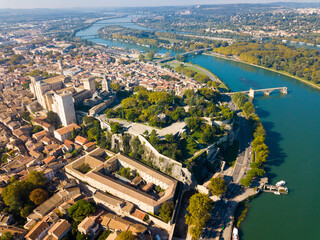 Picturesque view from drone of river Rhone and French city of Avignon with Gothic Palace of Papes..