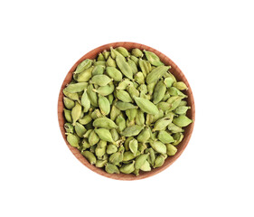 Wooden bowl with dry cardamom seeds isolated on white, top view