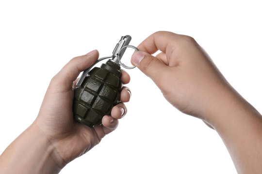 Man pulling safety pin out of hand grenade on white background, closeup