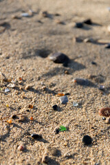 Fototapeta na wymiar beach glass in sand at sea glass beach in Puerto de Vieques, Puerto Rico