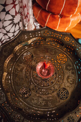 pink sparkling wine drink with strawberry heart garnish on cocktail pick