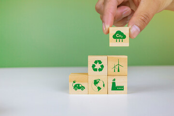 Set net zero carbon emission wooden cubes isolated green color icons. Renewable energy and healthy economy with the environment. CO2 reduction. concept of sustainable economic development