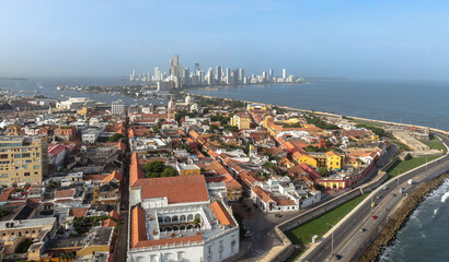 Aerial drone panorama of walled cartagena historic city with skyline in background / Colombia