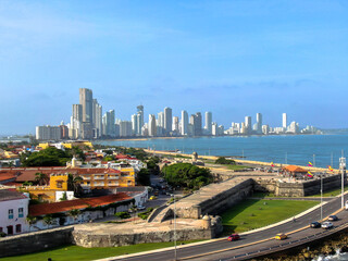 drone aerial of cartagena old city with skyline in background