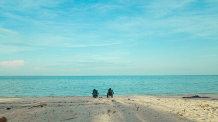 People by the coast at Besar Island or Pulau Besar in Mersing, Johor, Malaysia