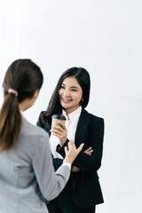Confident focused businesswoman, teacher or mentor coach speaking to business people at negotiations, woman leader speaker applicant talking at meeting or convincing hr during job interview concept