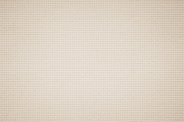 Fabric canvas woven texture background in pattern in light beige cream brown color.