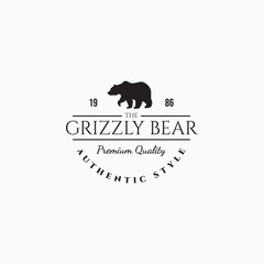Obraz premium Minimalist grizzly bear logo vector illustration design. Simple vintage bear logo design