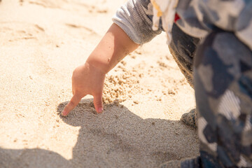 children playing in the sand