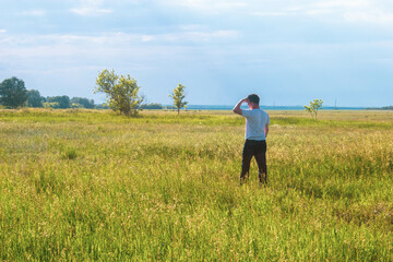 person walking in the field