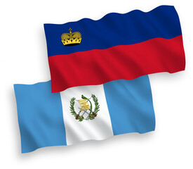 Fototapeta premium National vector fabric wave flags of Liechtenstein and Republic of Guatemala isolated on white background. 1 to 2 proportion.