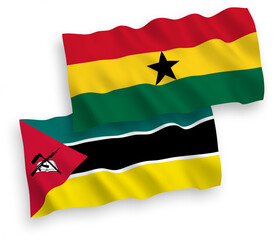 National vector fabric wave flags of Republic of Mozambique and Ghana isolated on white background. 1 to 2 proportion.