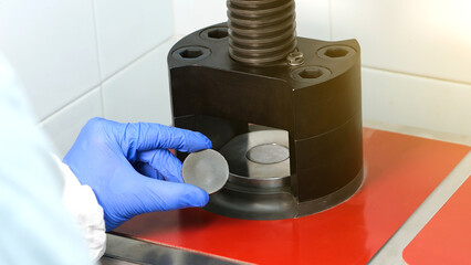 Preparation of samples for x-ray cement composition study in the laboratory.