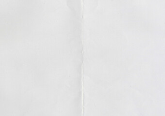 High resolution large image of white paper texture background scan folded in half, soft fine grain...