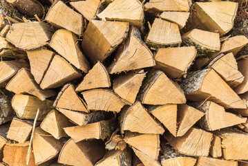 Full frame shot of wood pile, stacked and cut firewood