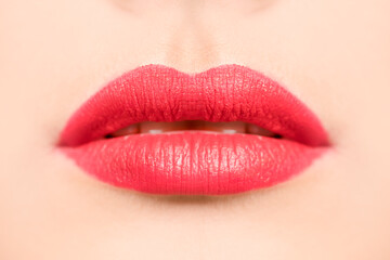 Sexy lips. Beautiful red lipstick. Sensual open mouth. Beautiful makeup close-up.
