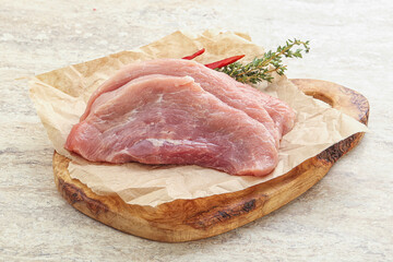 Raw pork schnitzel for roast