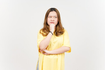 Obraz premium Thinking gesture of Beautiful Asian Woman wearing yellow T-Shirt Isolated On White Background