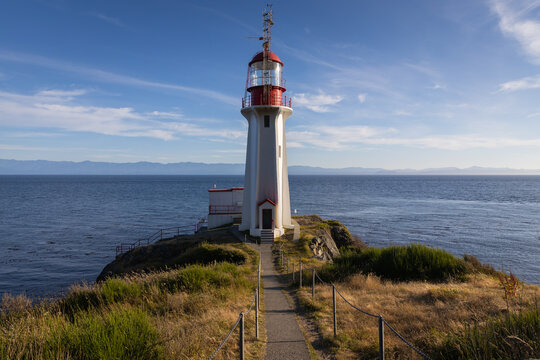 lighthouse on the coast just before golden hour on Vancouver Island, BC