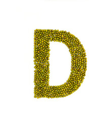 Capital letter D made from mung beans. Green mung bean font. Alphabet made from green gram . White background. Dry green maash seeds.