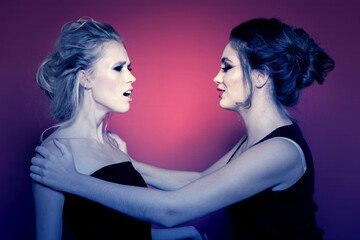 Two girls swear in the studio. Negative emotions.