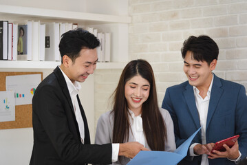 Business Asian people working together and brainstorming.