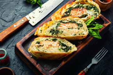 Salmon baked in dough.