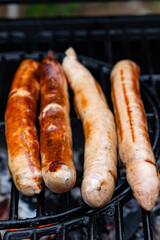 thuringian sausages on the charcoal grill