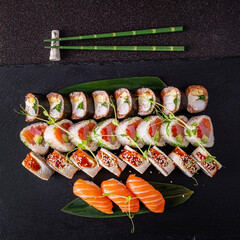 tasty sushi on the black background