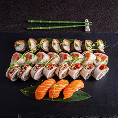 tasty sushi on the black background