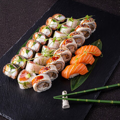 tasty sushi on the black background