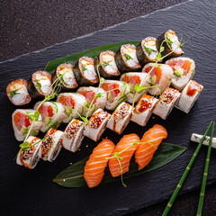 tasty sushi on the black background