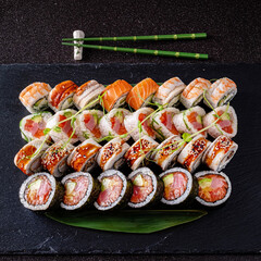 tasty sushi on the black background
