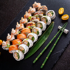 tasty sushi on the black background