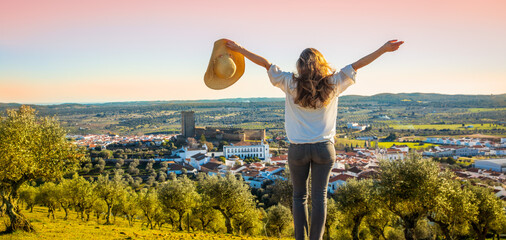 woman enjoying panoramic view of Alentejo region- Portugal,  Portel © M.studio
