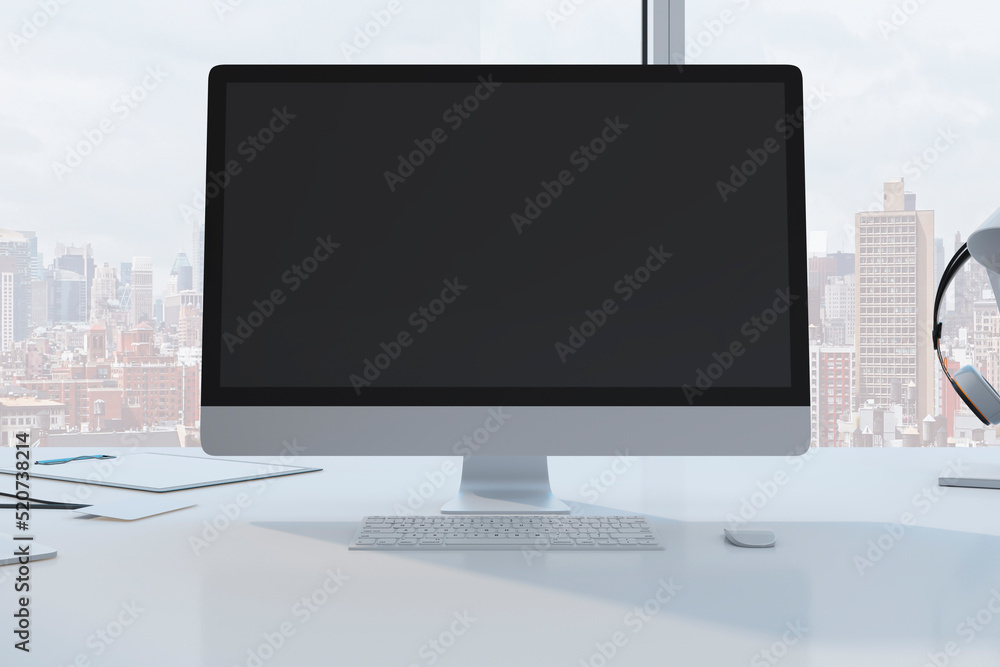 Fototapete close up of designer desktop with empty black mock up computer monitor laptop and supplies in modern