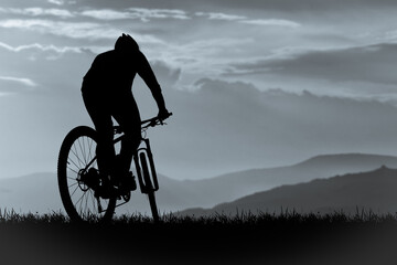 Silhouette of mountain bikers with beautiful views. bike exercise concept