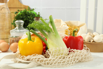 Concept of cooking with different food on white wooden table